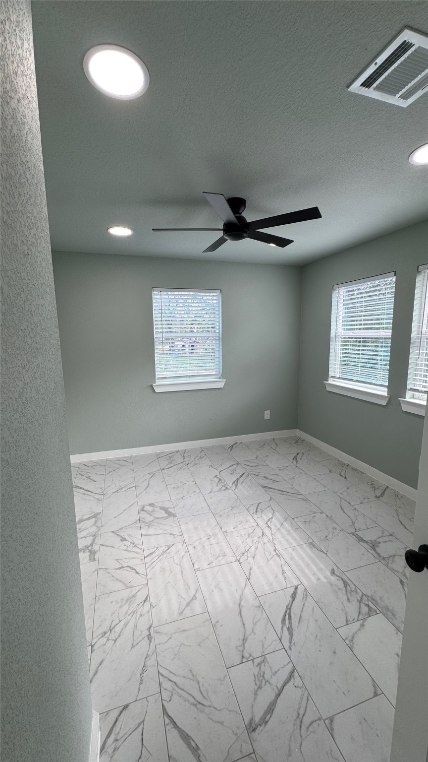 169 South 10th Street Conroe, TX 77301 - Photo 35 of 42 a view of an empty room and window