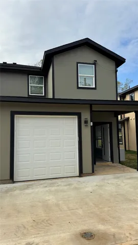 a view of a hallway view with staircase