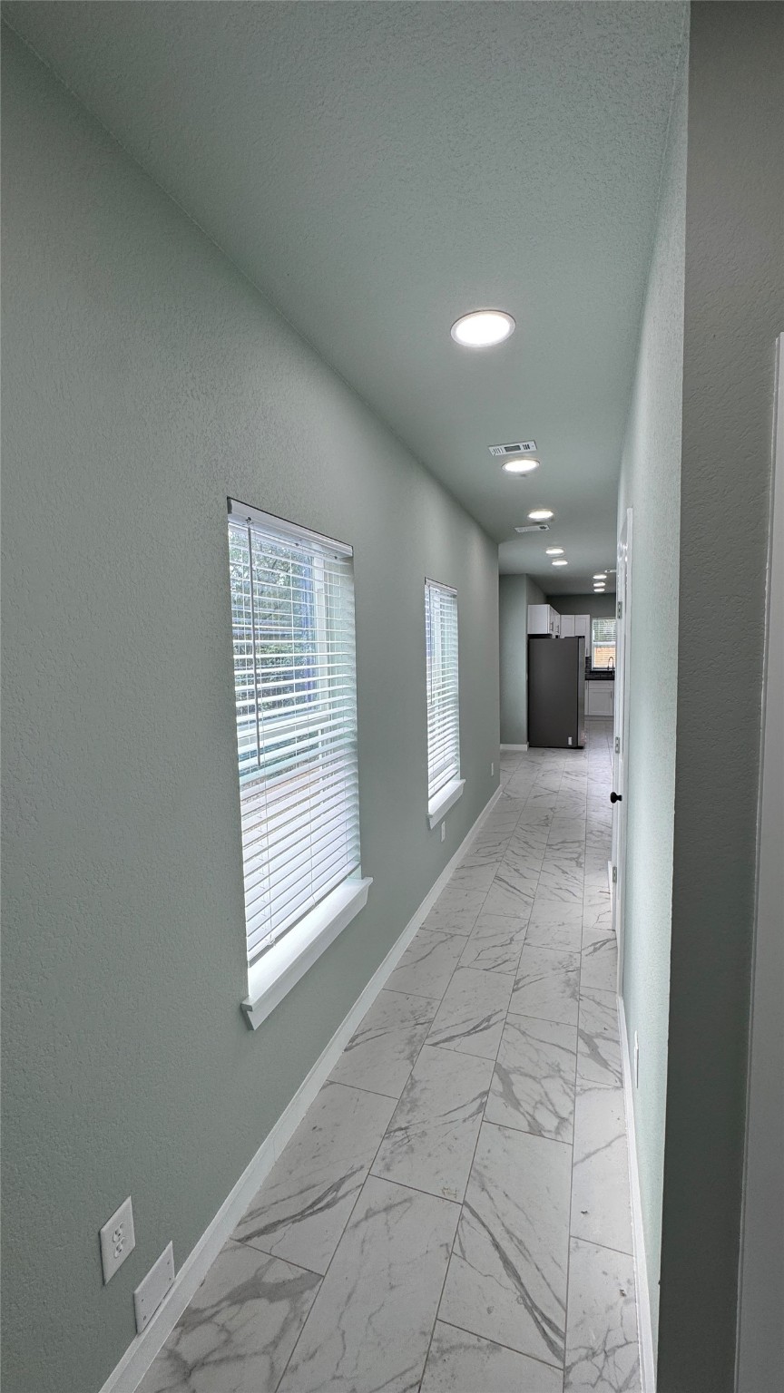 169 South 10th Street Conroe, TX 77301 - Photo 6 of 42 a view of livingroom and window