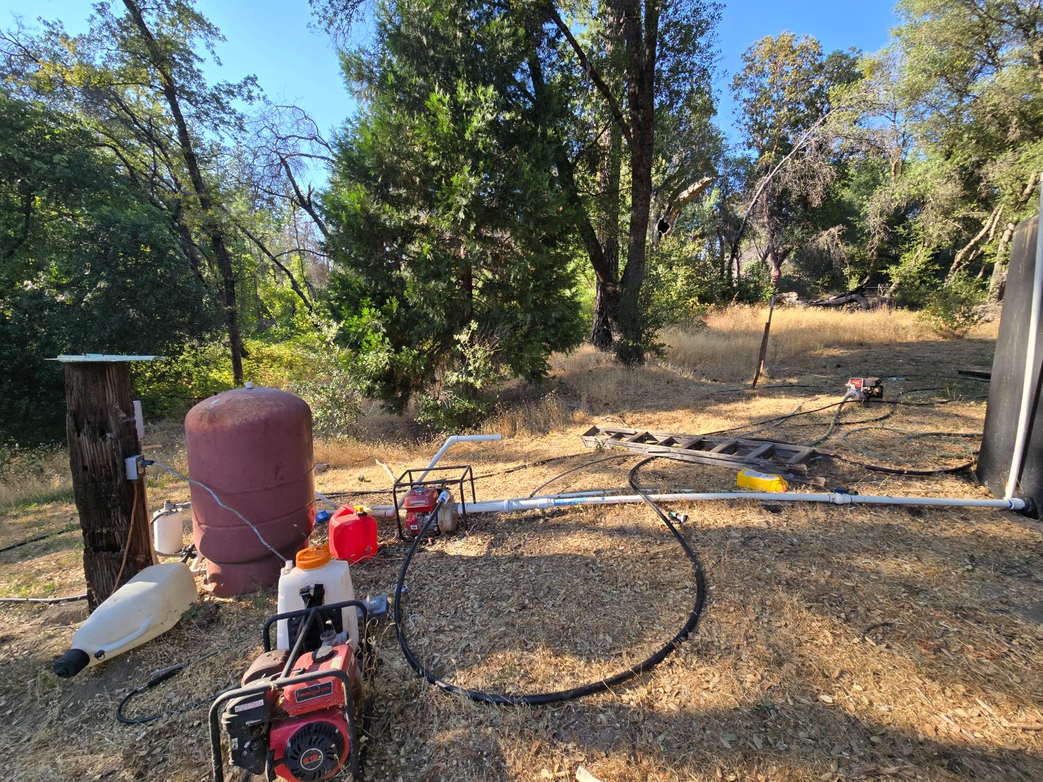 804 Craig Access Road Oroville, CA 95966 - Photo 12 of 31 a view of a backyard with sitting area and furniture