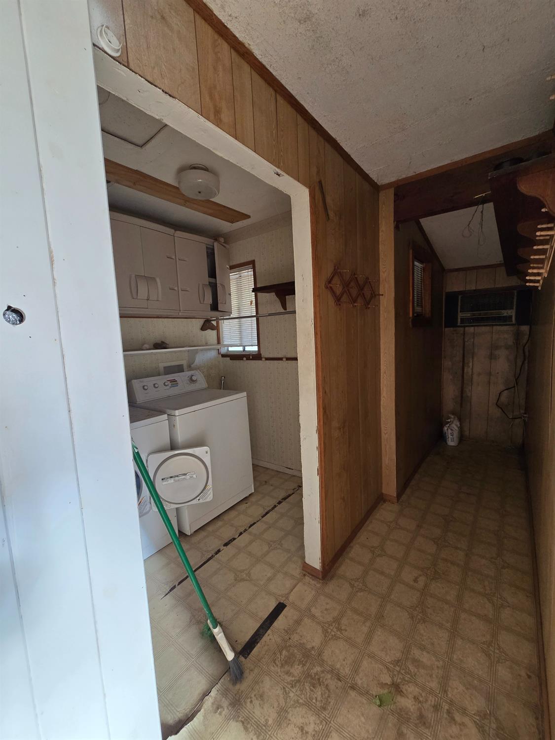 804 Craig Access Road Oroville, CA 95966 - Photo 24 of 31 a kitchen with a refrigerator and cabinets
