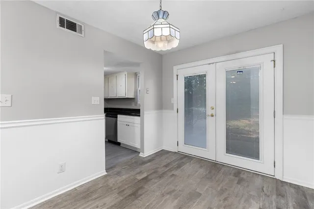 a view of a kitchen from the hallway