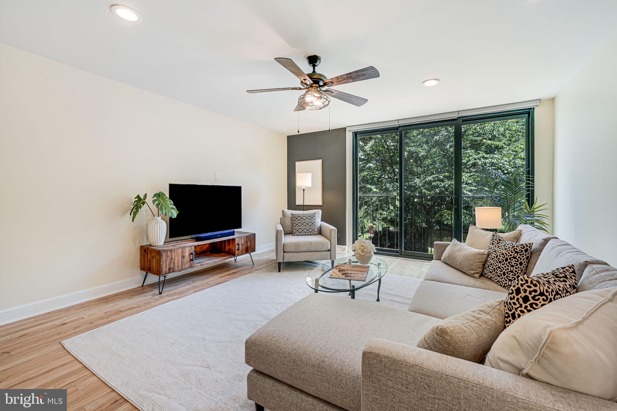 11467 Washington Plaza West Reston, VA 20190 - Photo 11 of 44 Spacious Living Room with Lake Views