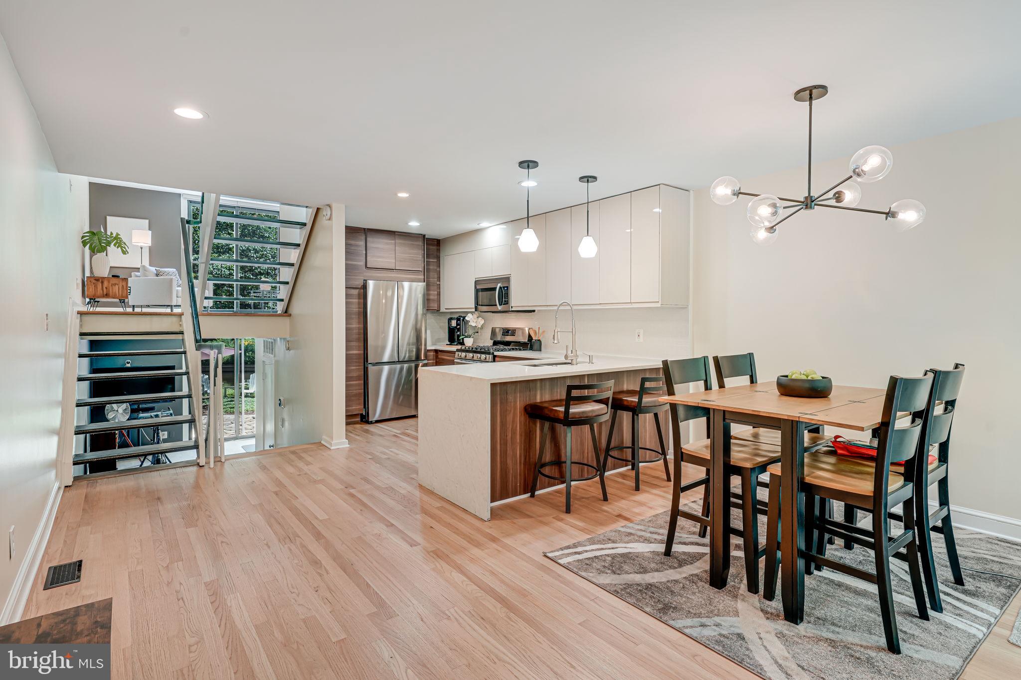 11467 Washington Plaza West Reston, VA 20190 - Photo 5 of 44 Modern Updated Kitchen Opening to Dining