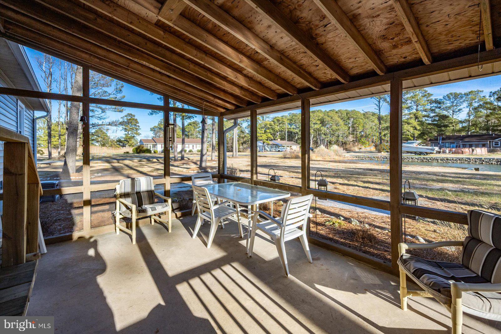 5241 Frances Road Marion Station, MD 21838 - Photo 109 of 146 a view of a dining room with furniture window and outside view