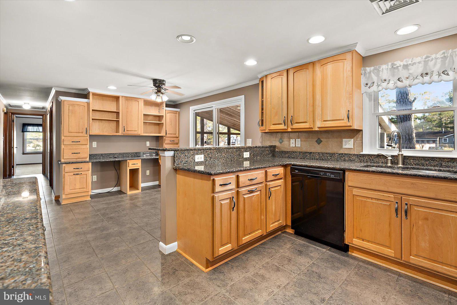 5241 Frances Road Marion Station, MD 21838 - Photo 126 of 146 a kitchen with stainless steel appliances granite countertop a stove a sink and a microwave