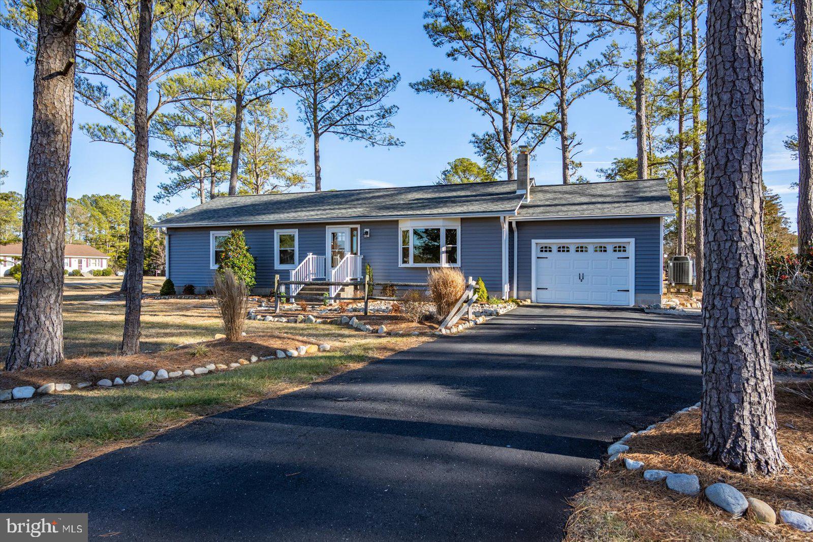 5241 Frances Road Marion Station, MD 21838 - Photo 137 of 146 a view of a house with backyard porch and sitting area