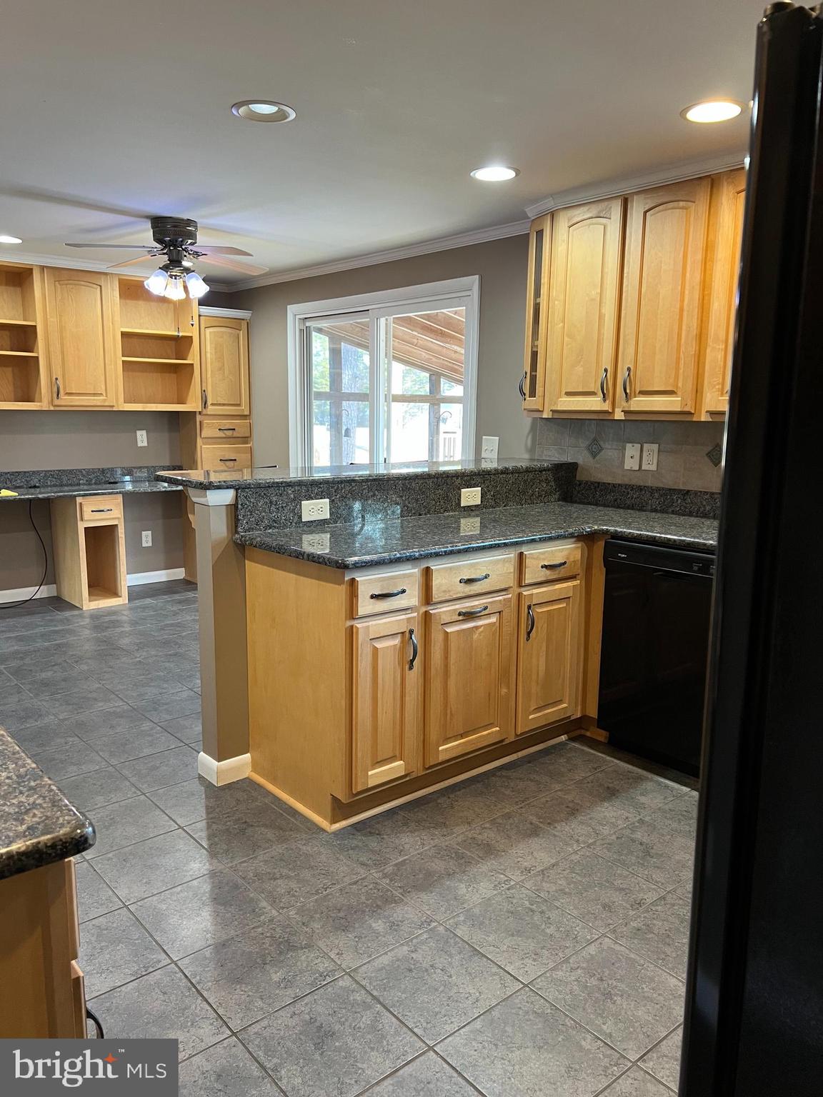 5241 Frances Road Marion Station, MD 21838 - Photo 21 of 146 a kitchen with stainless steel appliances granite countertop a stove a sink and a microwave
