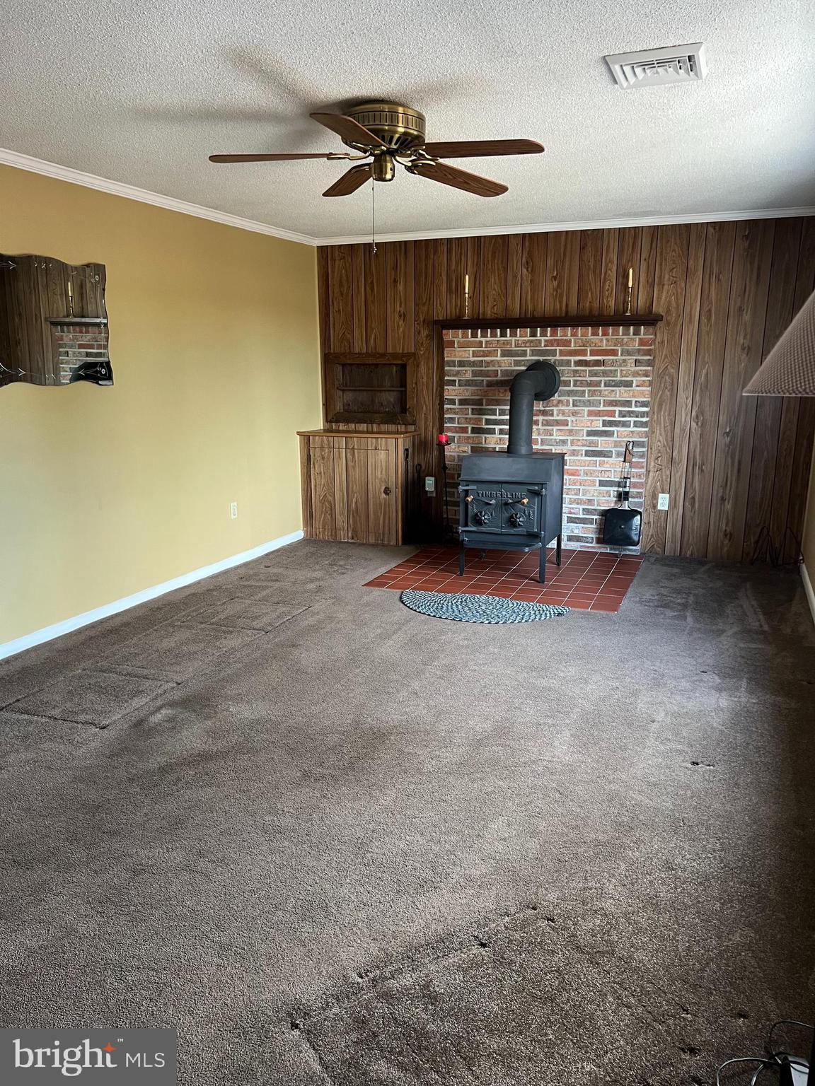 5241 Frances Road Marion Station, MD 21838 - Photo 30 of 146 a view of a livingroom with furniture and a fireplace