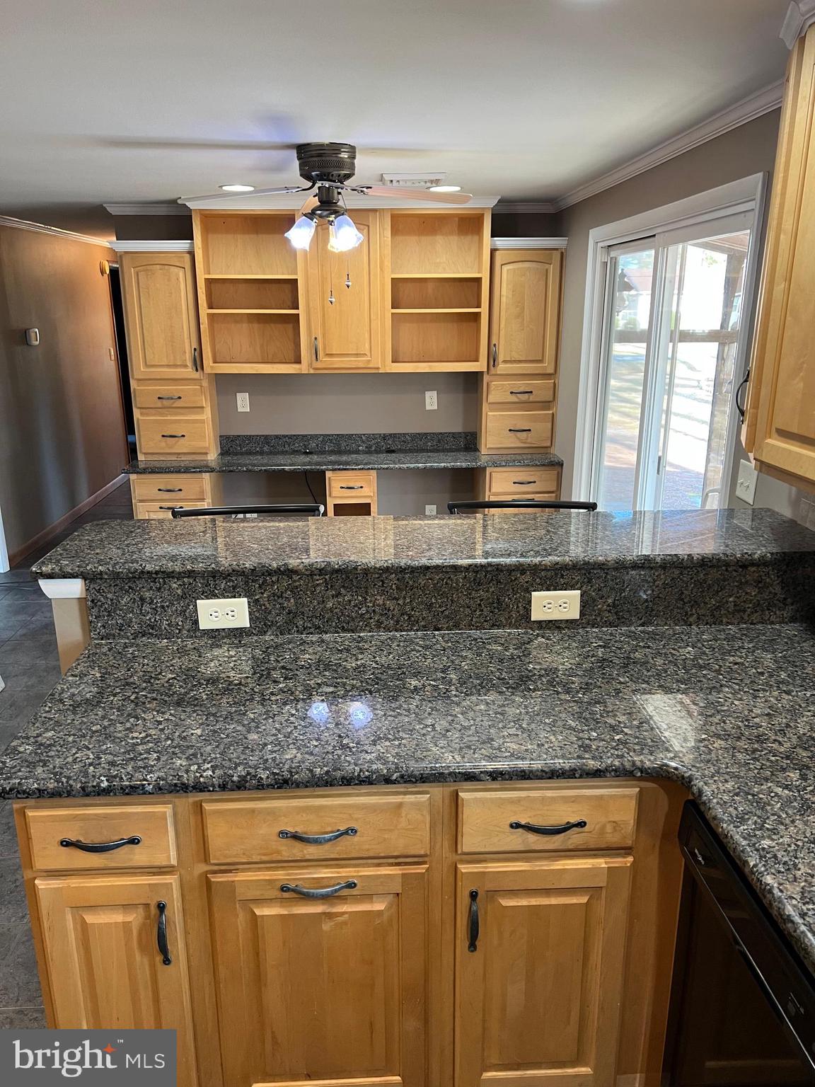 5241 Frances Road Marion Station, MD 21838 - Photo 39 of 146 a kitchen with stainless steel appliances granite countertop a sink and cabinets