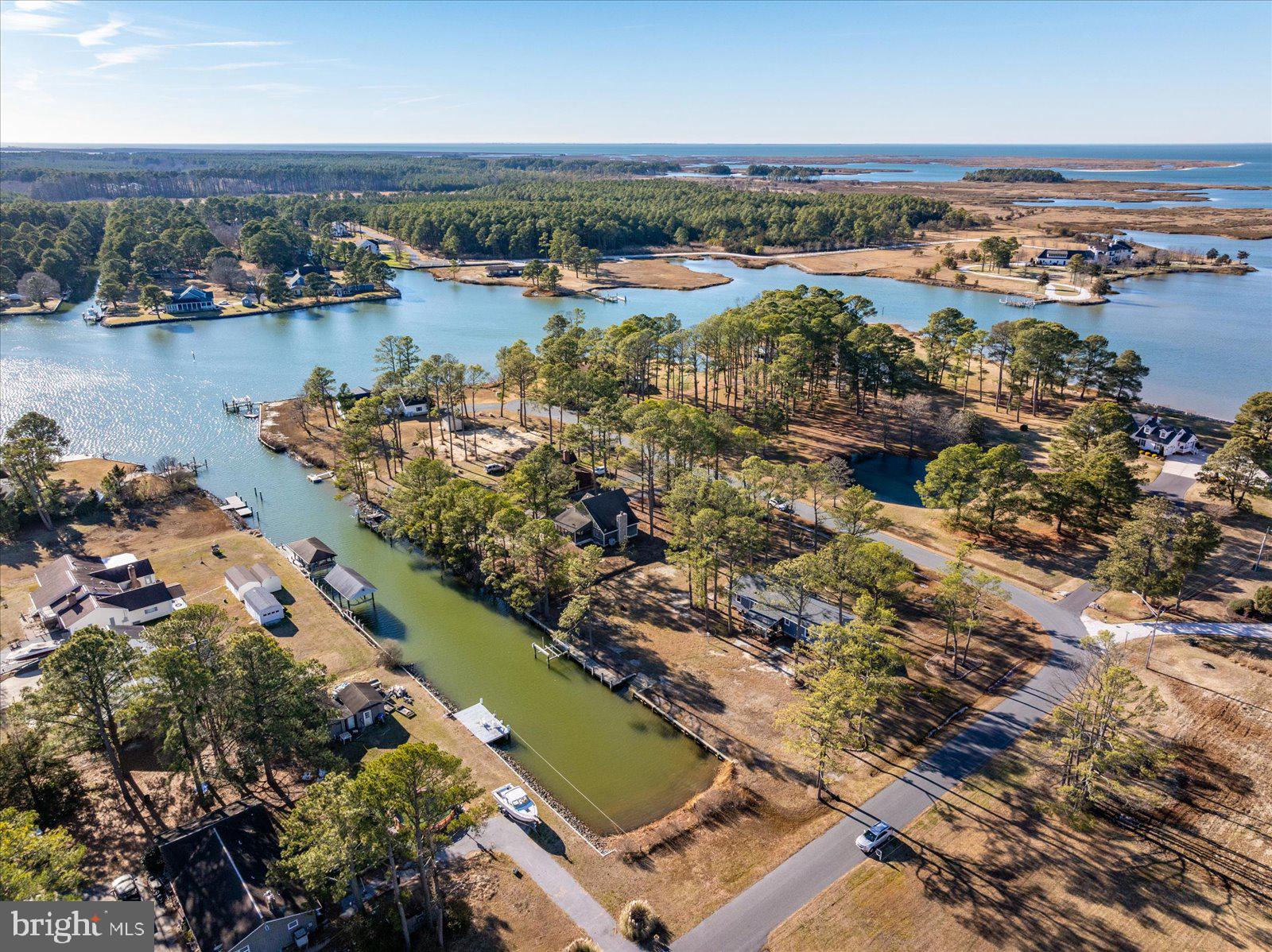 5241 Frances Road Marion Station, MD 21838 - Photo 70 of 146 an aerial view of ocean and residential houses with outdoor space