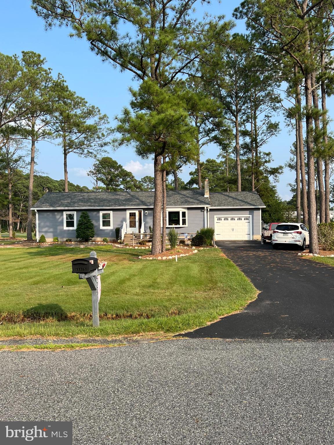 5241 Frances Road Marion Station, MD 21838 - Photo 7 of 146 a front view of a house with a garden