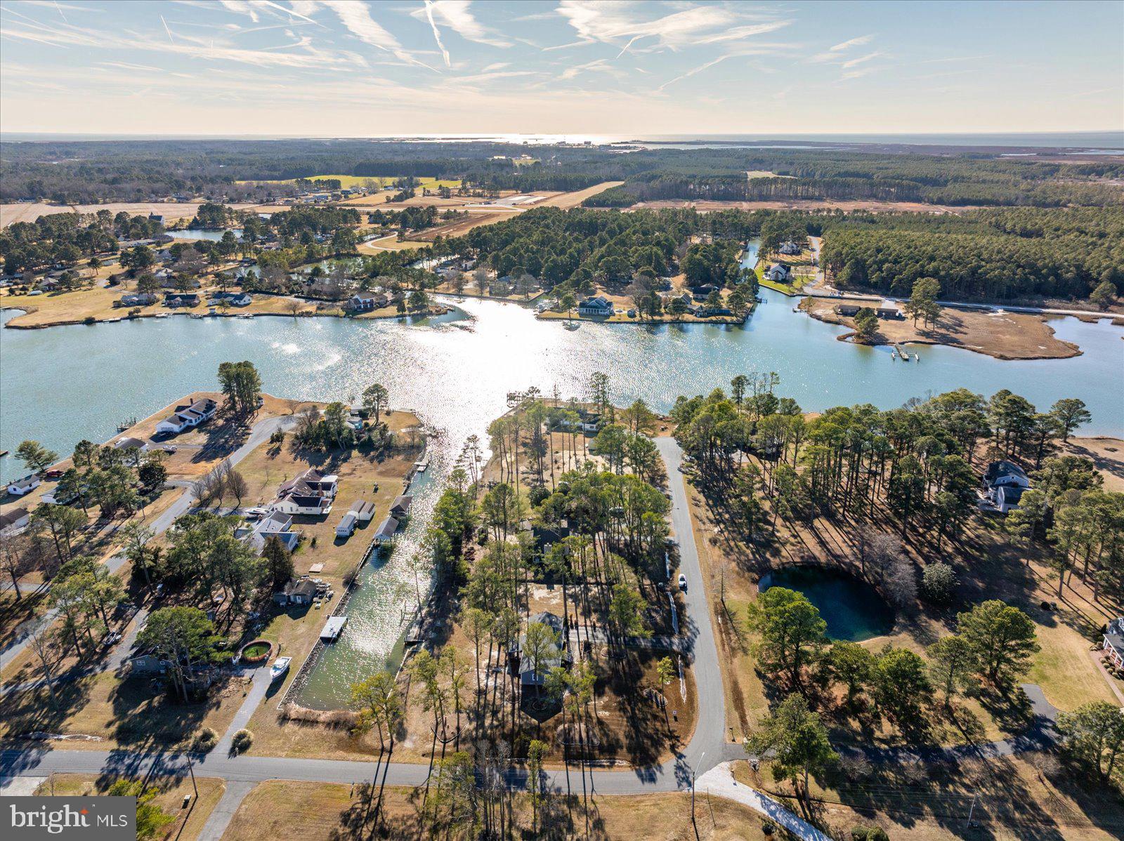 5241 Frances Road Marion Station, MD 21838 - Photo 76 of 146 an aerial view of a city with lots of residential buildings lake and ocean view