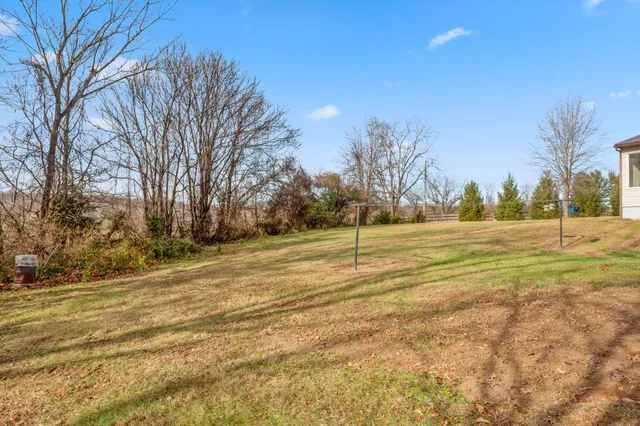 a view of a outdoor space with a swimming pool