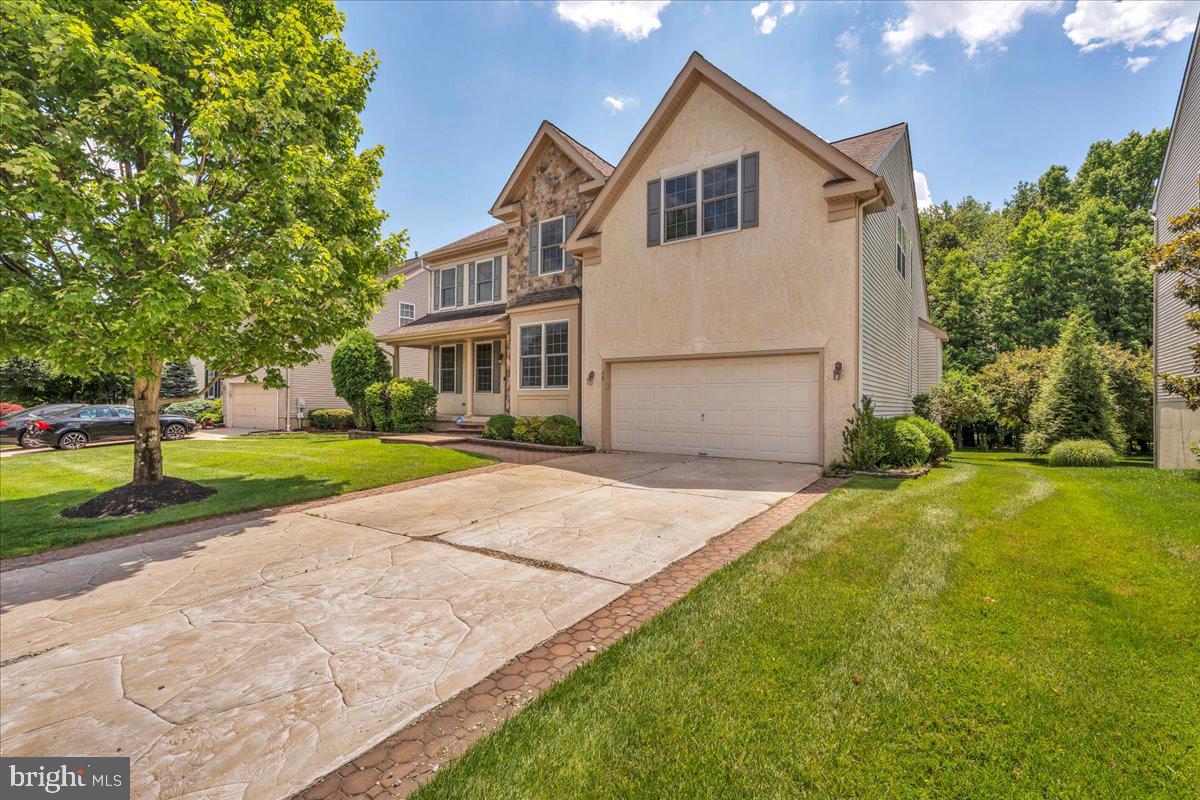 68 Hillside Lane Mount Laurel, NJ 08054 - Photo 2 of 36 a view of a white house with a yard and large tree