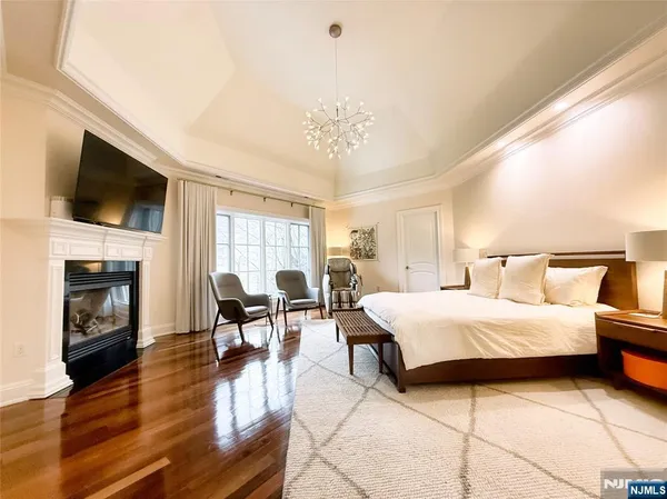 a large spacious bathroom with a large tub and sink