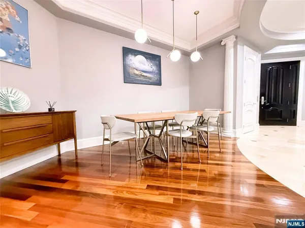 a view of a dining room with furniture