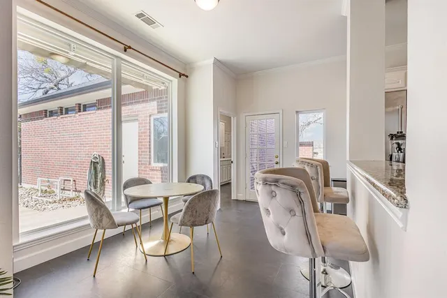 a living room with fireplace furniture and a flat screen tv