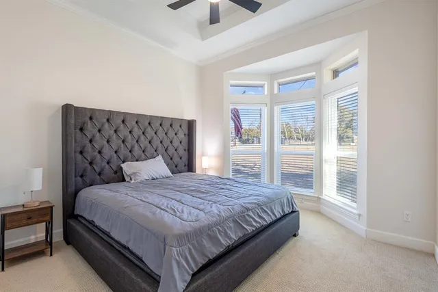 a utility room with cabinets washer and dryer