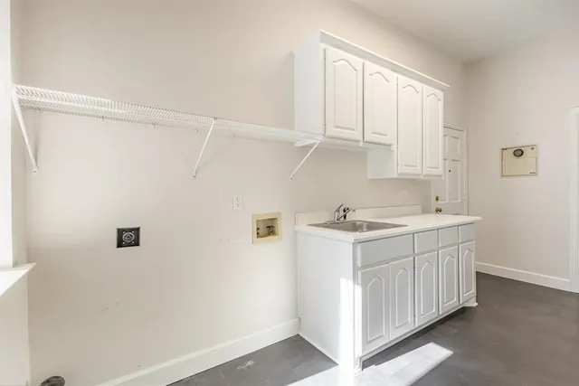 a view of a chairs and table in a patio