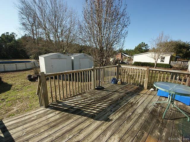 877 Lyon Road Awendaw, SC 29429 - Photo 24 of 30 deck overlooks backyard