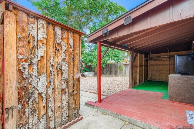 a backyard of a house with seating space