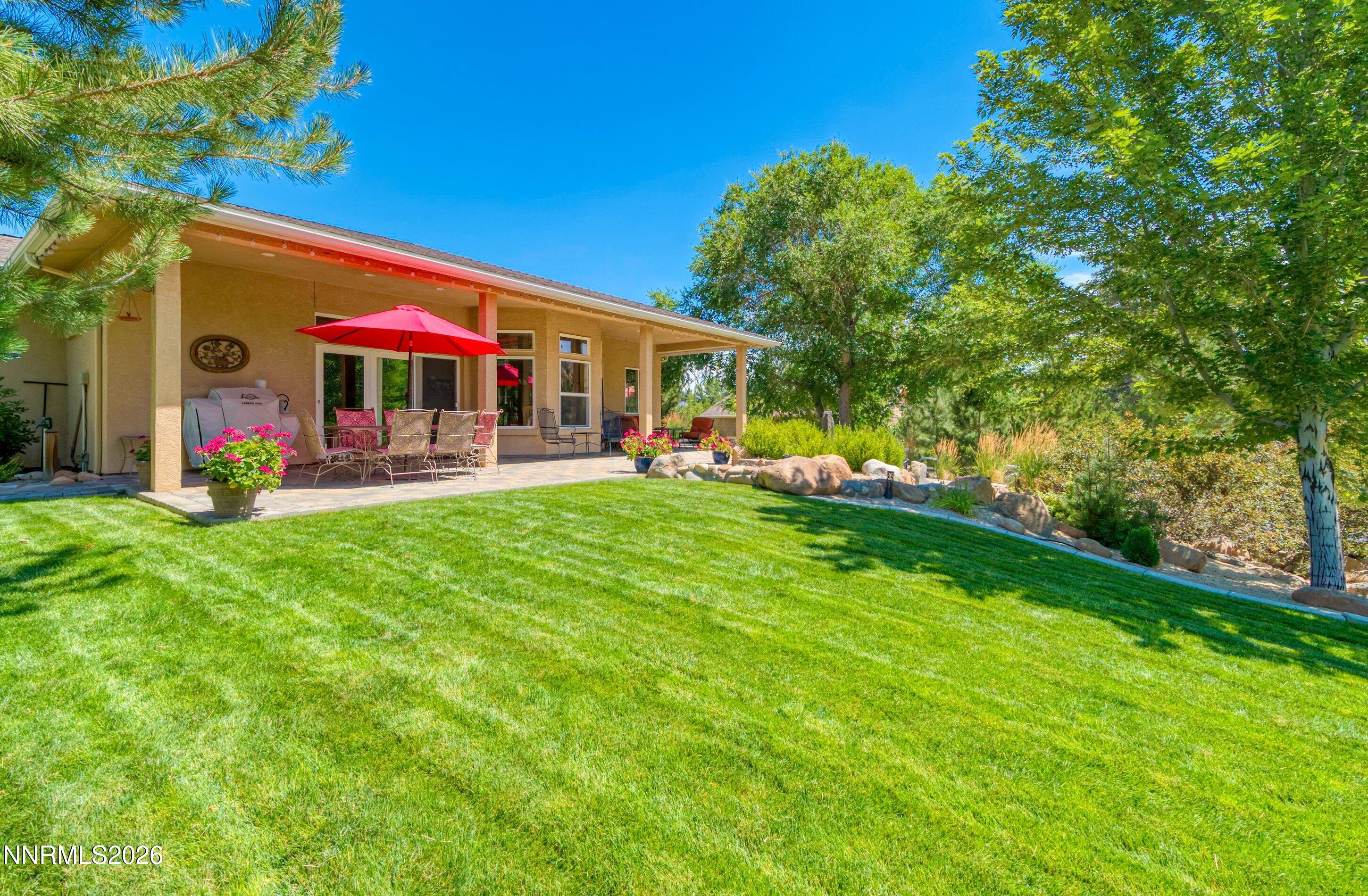310 Kitts Way Reno, NV 89521 - Photo 54 of 114 a front view of a house with swing and a patio