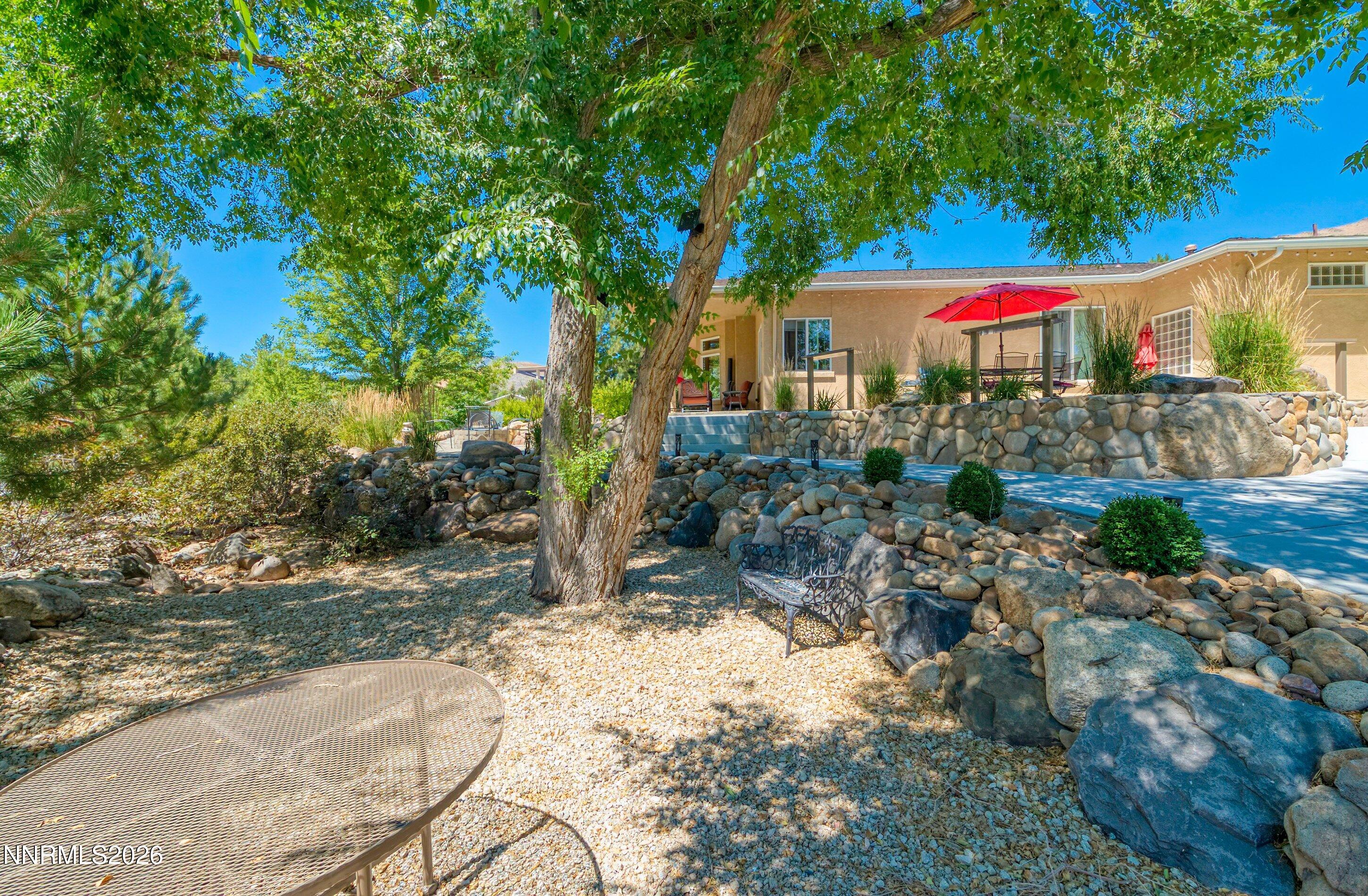 310 Kitts Way Reno, NV 89521 - Photo 84 of 114 a view of a backyard with a patio