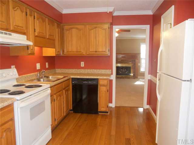 4617 Hershey Court Raleigh, NC 27613 - Photo 2 of 13 New counter tops, new light fixture. Custom cabinets and hardwoods