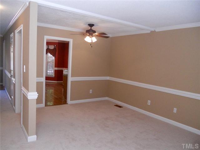 4617 Hershey Court Raleigh, NC 27613 - Photo 6 of 13 Dining room adjoins family room and is recently painted