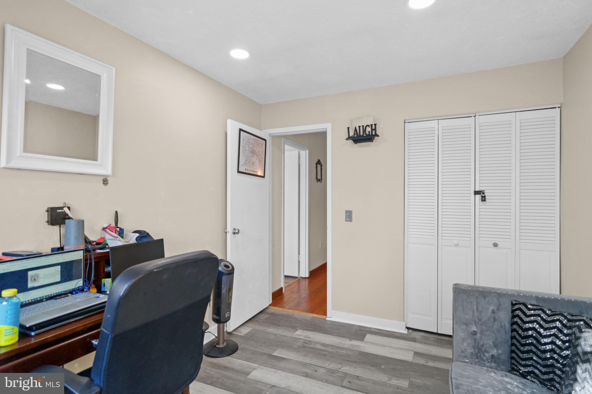 2363 Nutmeg Terrace Baltimore, MD 21209 - Photo 12 of 29 a view of a workspace with furniture and wooden floor