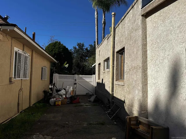 a view of a backyard of the house