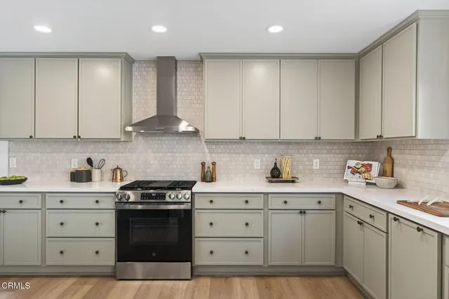 a kitchen with sink and window