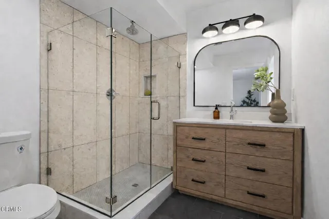 a view of a house with backyard and swimming pool