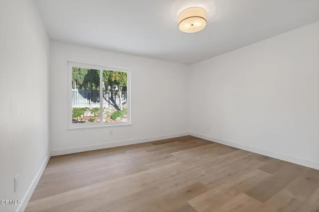 a view of a swimming pool with a yard