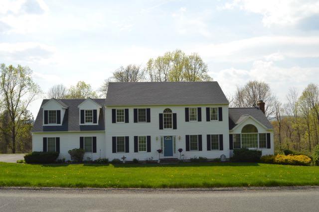 24 Pleasant View Road New Milford, CT 06776 - Photo 1 of 1 a view of a yard in front of a brick house