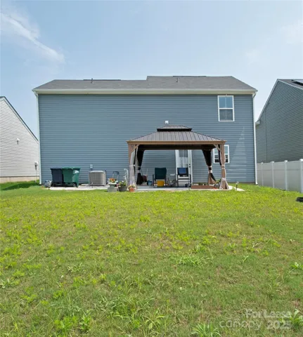 a front view of house with yard