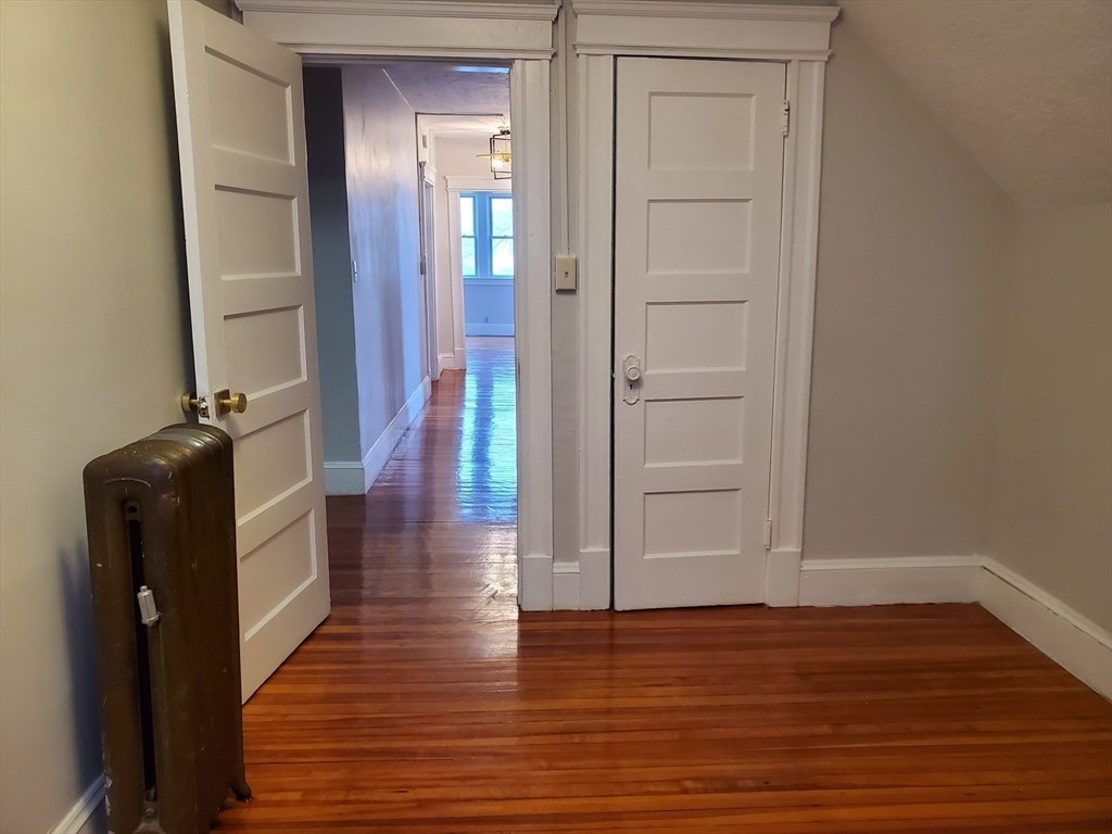 25 Kimberly Avenue, Unit 2 Springfield, MA 01108 - Photo 19 of 19 a view of hallway with wooden floor