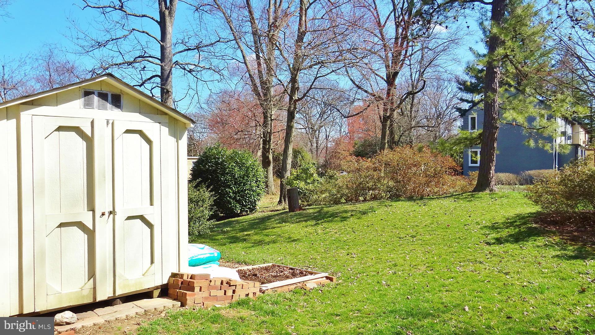 6 Crescent Road, Unit E Greenbelt, MD 20770 - Photo 13 of 15 Side Yard With Shed