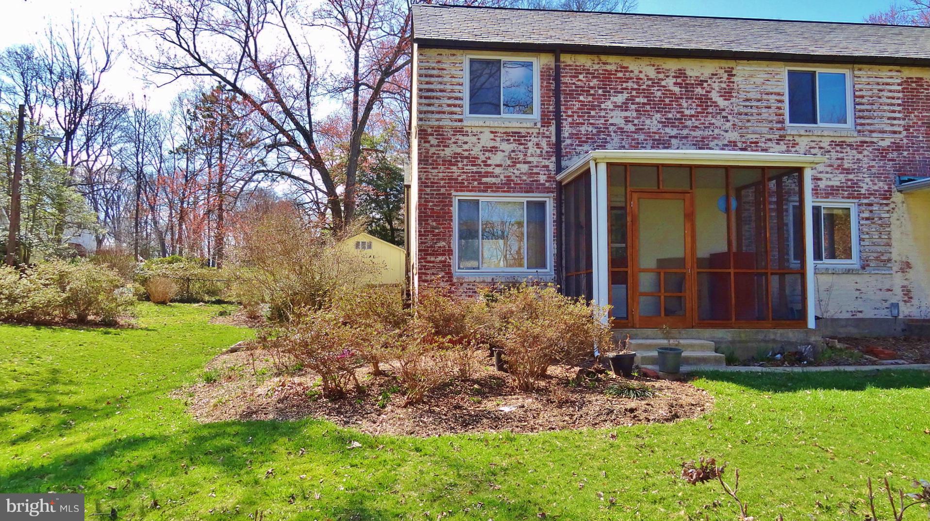 6 Crescent Road, Unit E Greenbelt, MD 20770 - Photo 7 of 15 Rear Yard/Screen Porch