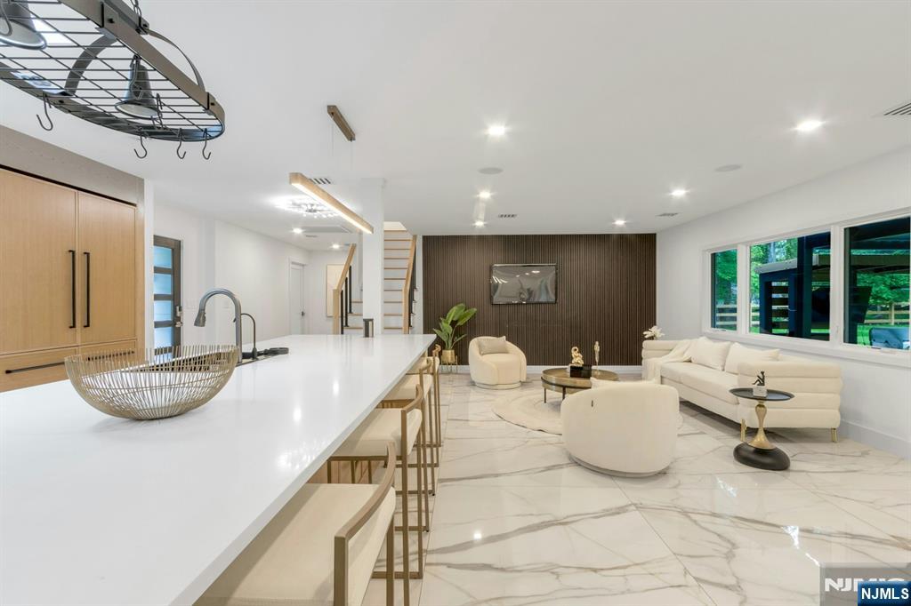 14 Rambling Brook Road Upper Saddle River, NJ 07458 - Photo 12 of 40 a living room with furniture and window
