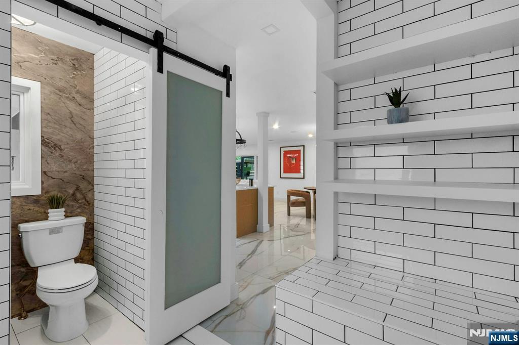 14 Rambling Brook Road Upper Saddle River, NJ 07458 - Photo 17 of 40 a bathroom with a toilet and a shower