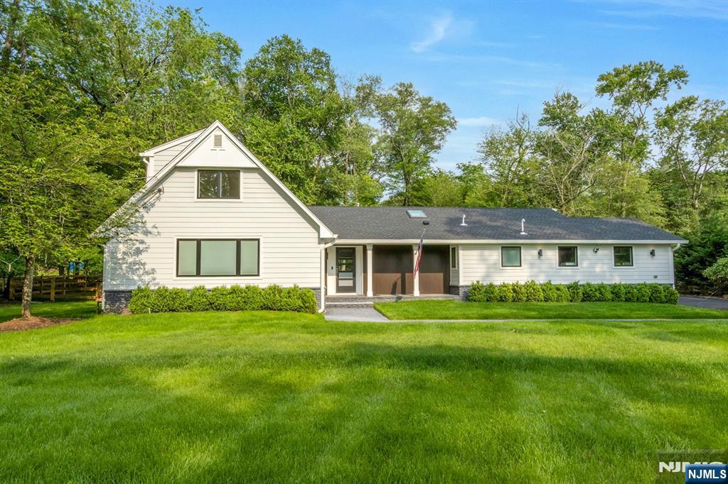 14 Rambling Brook Road Upper Saddle River, NJ 07458 - Photo 2 of 40 a view of a house with a yard