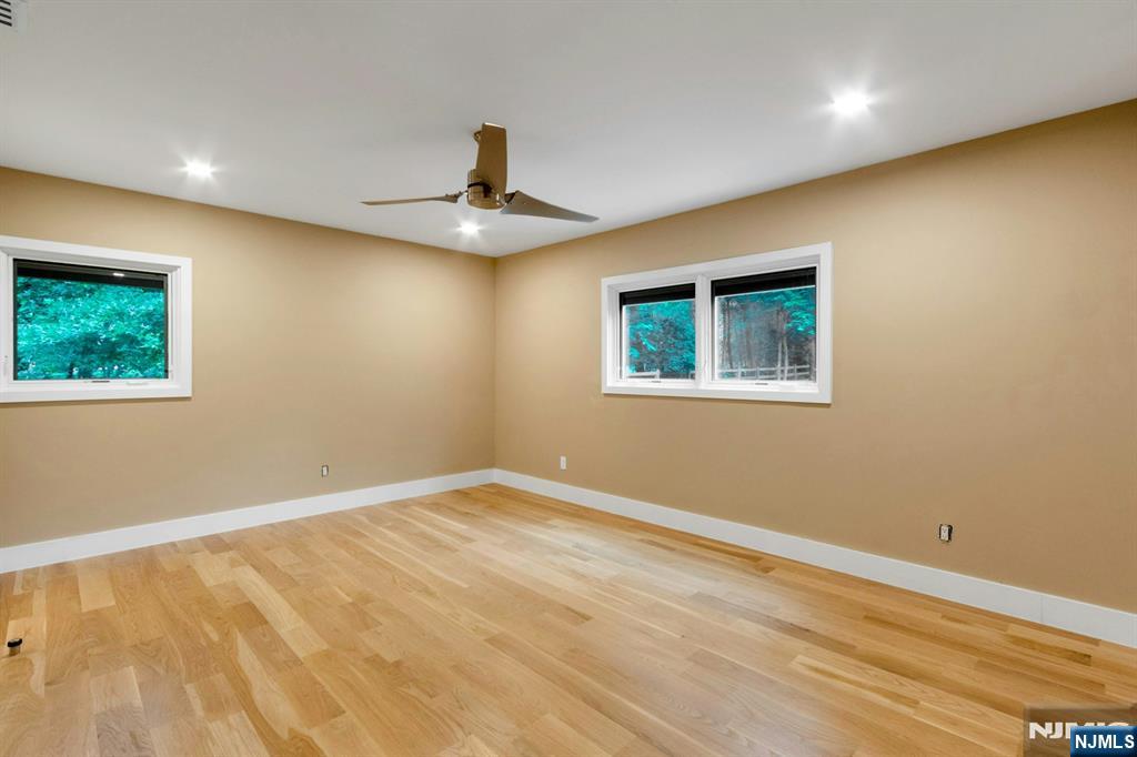 14 Rambling Brook Road Upper Saddle River, NJ 07458 - Photo 24 of 40 a view of an empty room with a window