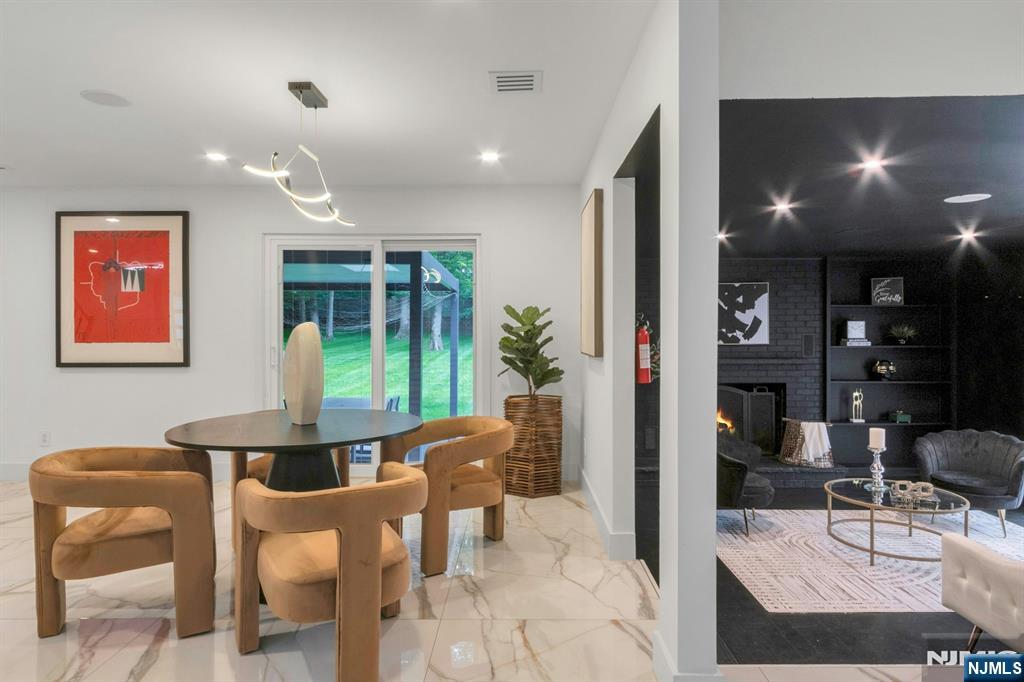 14 Rambling Brook Road Upper Saddle River, NJ 07458 - Photo 10 of 40 a dining room with furniture and window