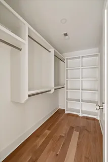 a view of a bathroom with a shower and a sink