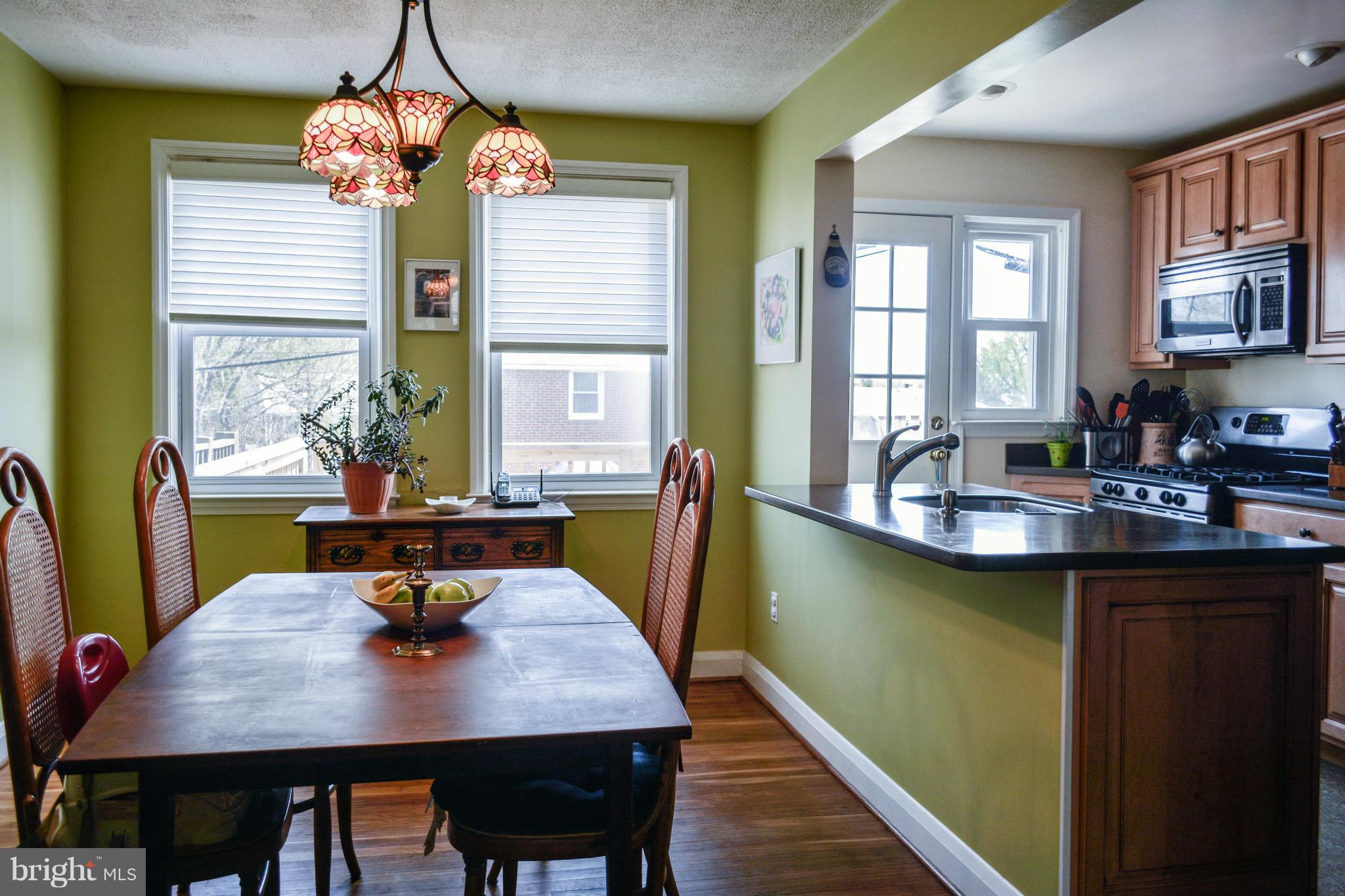 1604 Loch Ness Road Baltimore, MD 21286 - Photo 2 of 26 a view of a dining room with furniture window and wooden floor