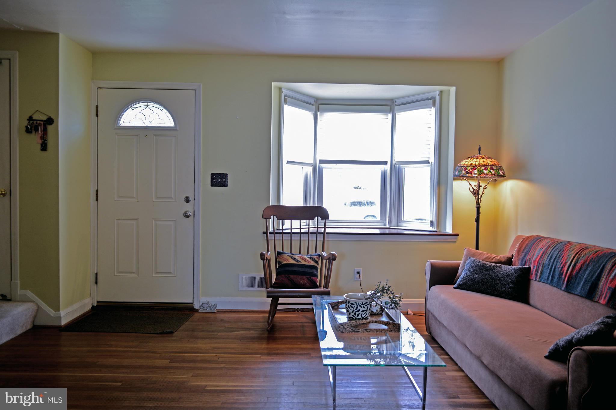 1604 Loch Ness Road Baltimore, MD 21286 - Photo 12 of 26 a living room with furniture and wooden floor