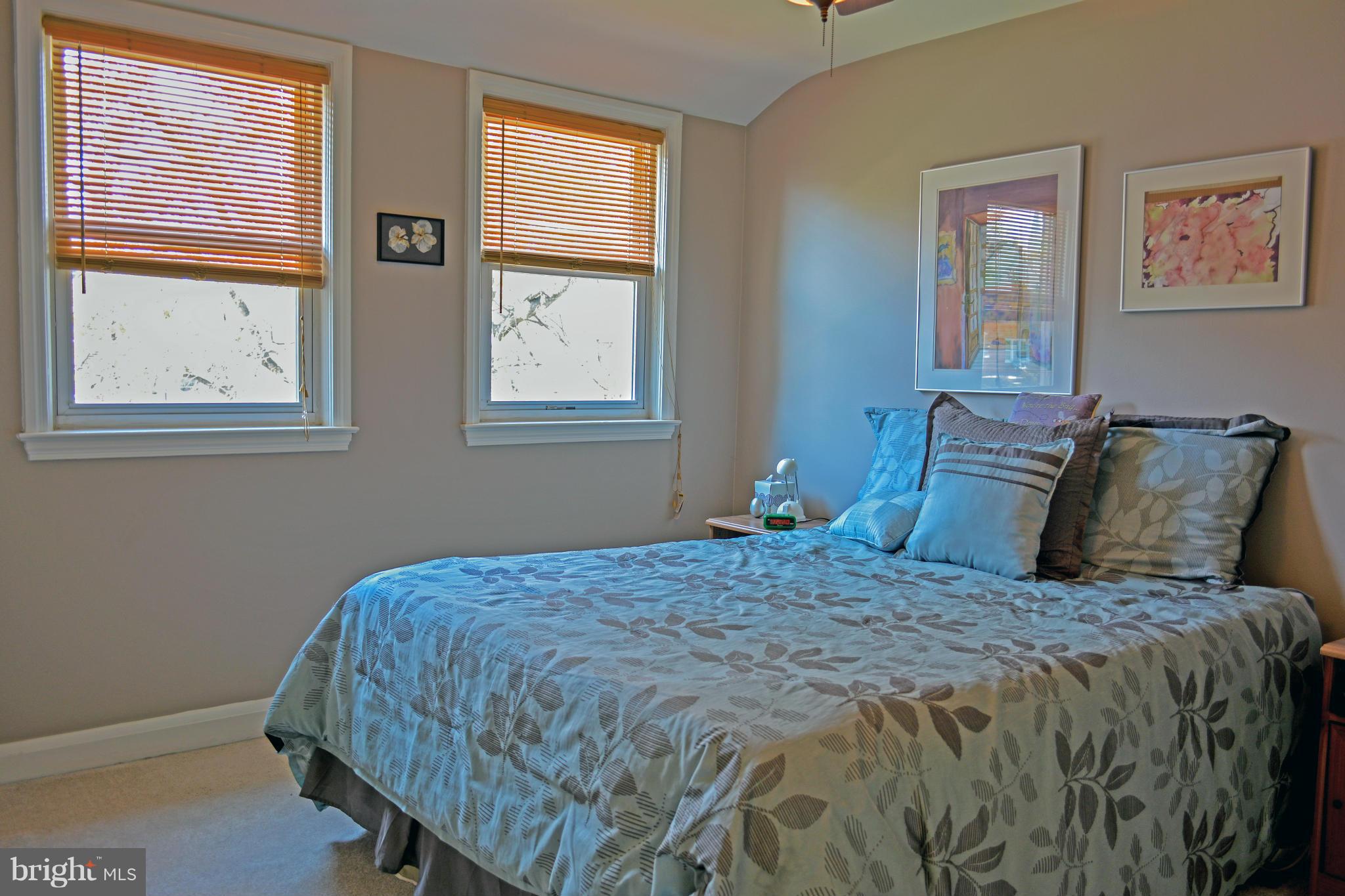 1604 Loch Ness Road Baltimore, MD 21286 - Photo 15 of 26 a bedroom with a bed and a window
