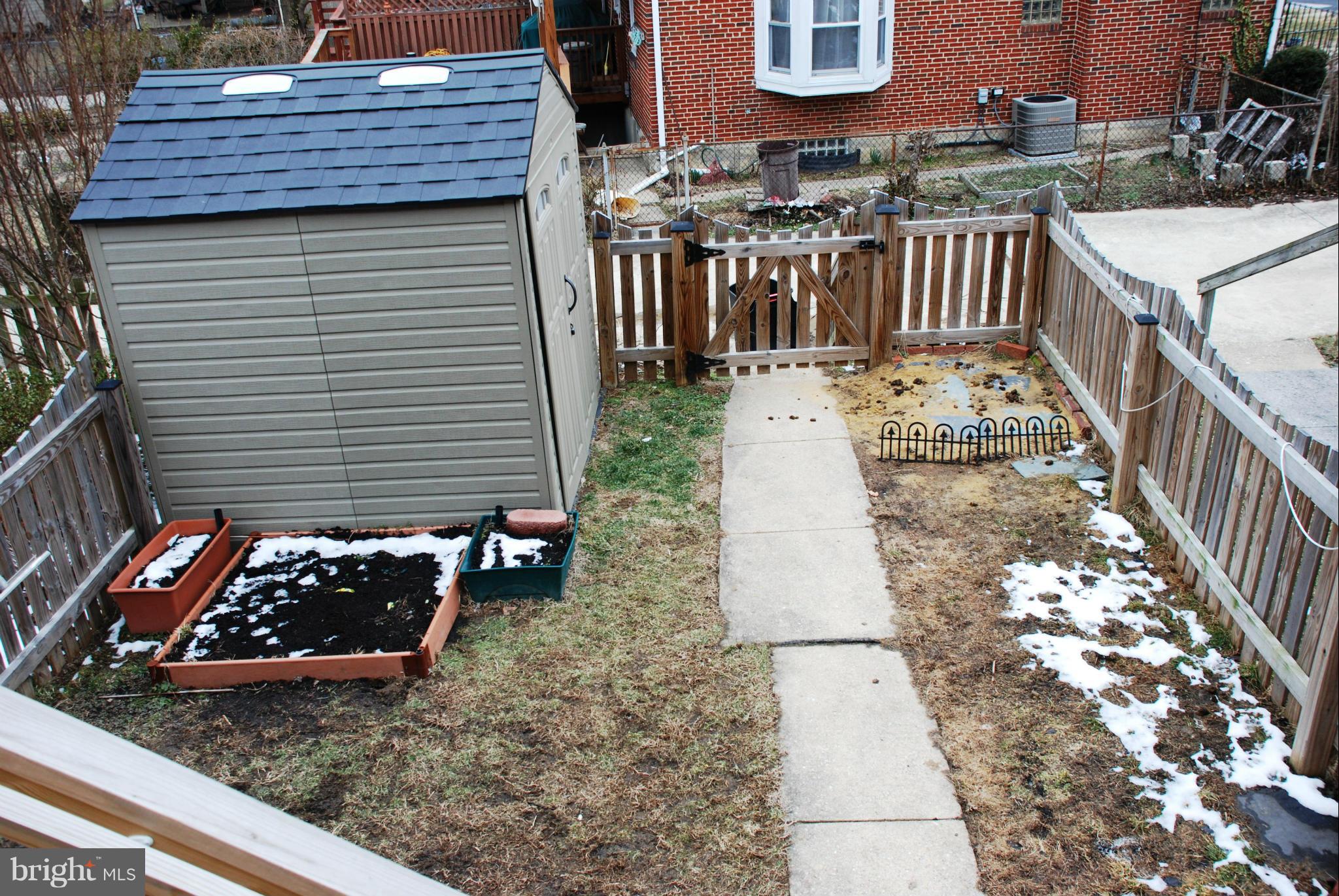 1604 Loch Ness Road Baltimore, MD 21286 - Photo 26 of 26 a view of a patio with table and chairs